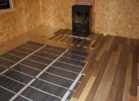 Как выбрать ламинат под теплый пол?