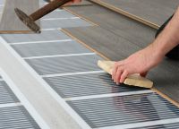 Как выбрать ламинат под теплый пол?