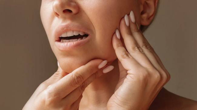 Способы облегчить боль в челюсти